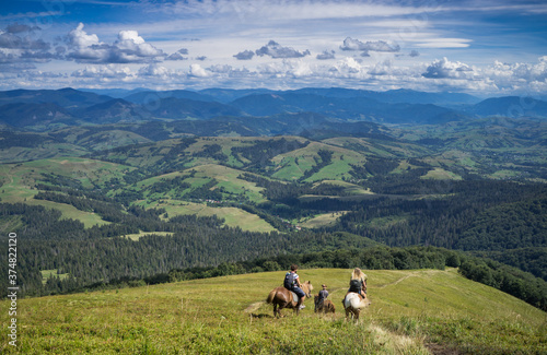 Horseback riding in the Carpathian mountains. © baxys