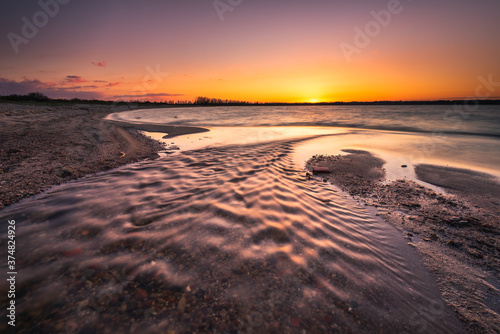 Baltic sea beach during sunset in Rewa. Baltic Sea. Poland