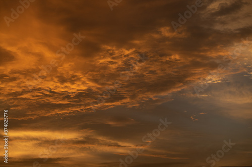 Orange clouds in the sky during the sunset © Shiv Mer