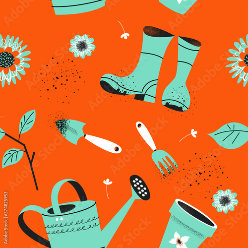Seamless pattern on an orange background. Tools for seasonal work in the garden.