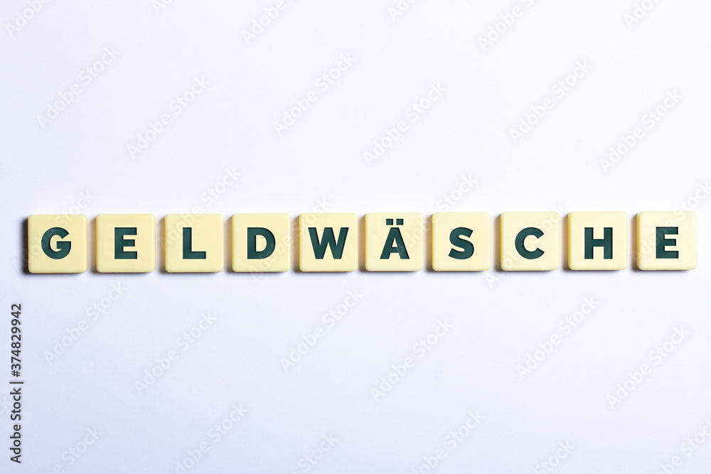 Geldwäsche in Buchstaben auf weißem Hintergrund Geldwäsche in Buchstaben auf weißem Hintergrund