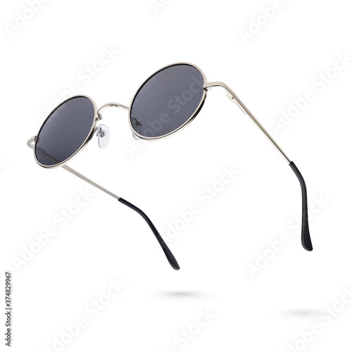 Round gray gun metal sunglasses isolated on white
