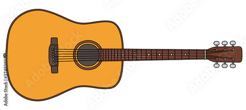 The vectorized hand drawing of a classic accoustic guitar