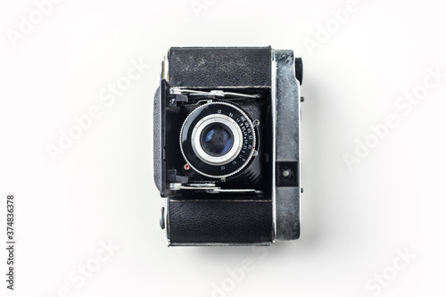 Top view of vintage cameras on white background