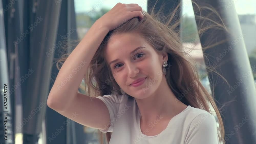 A slow motion shot of blond hair blowing in the wind. Blonde girl. Hair care. A slow motion shot of blond hair blowing in the wind. Blonde girl. Hair care.
