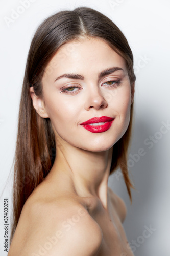 Lady bare shoulders Red lips clean skin model 
