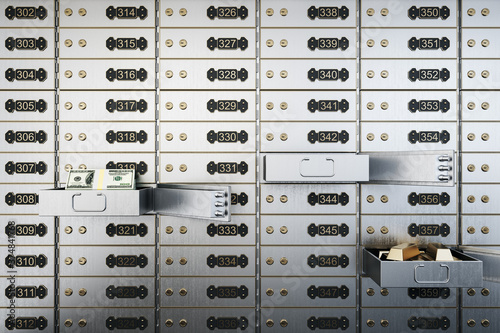 Obraz na plátně Unlock safety deposit boxes in bank.