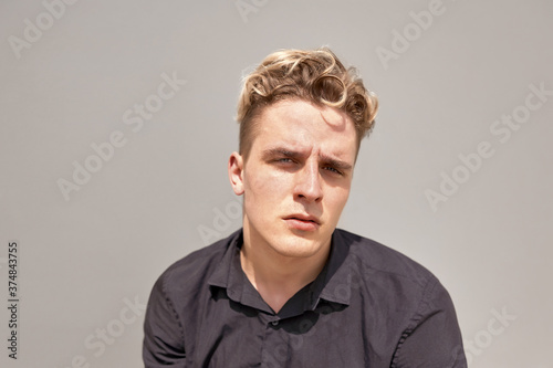  Isolated emotional portrait of a guy 