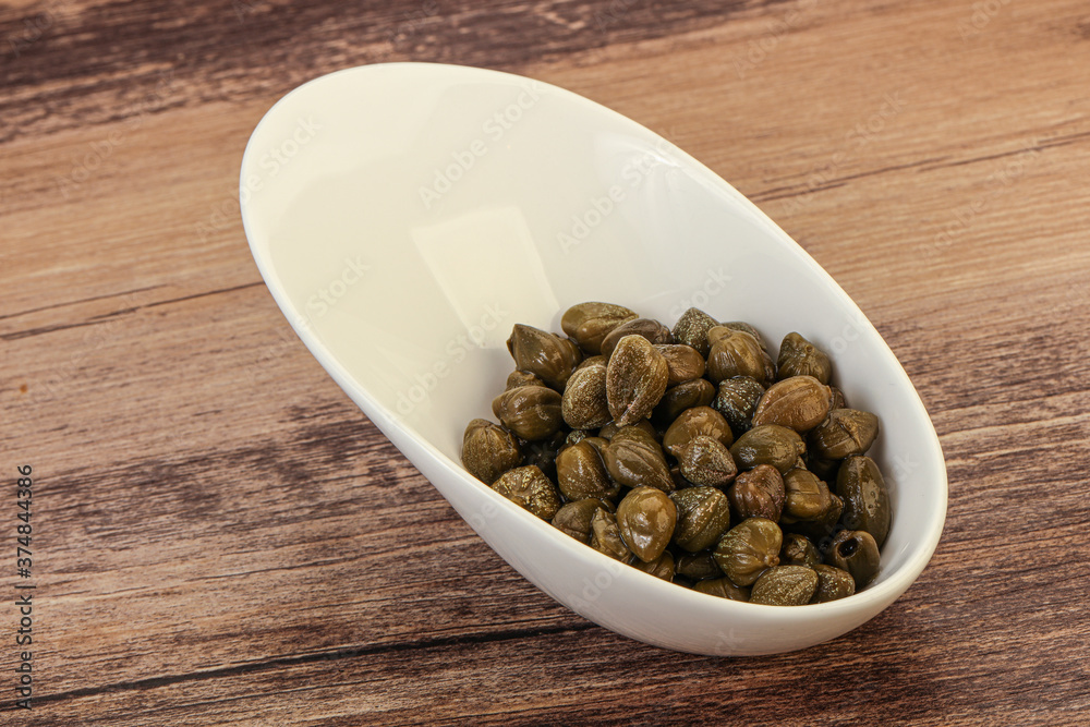 Tasty capers in the bowl Tasty capers in the bowl