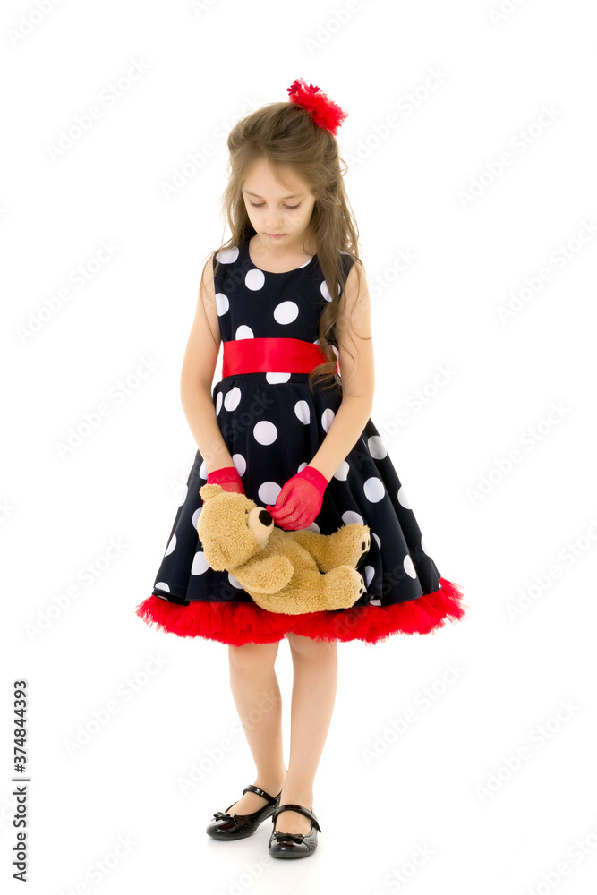 Pretty Long Haired Girl Wearing Polka Dot Dress Posing with Teddy Bear Pretty Long Haired Girl Wearing Polka Dot Dress Posing with Teddy Bear