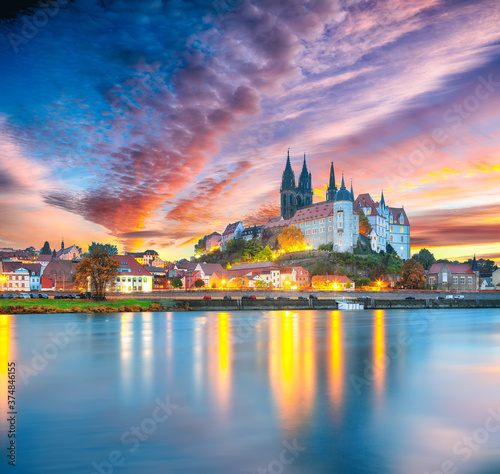 Awesome view on Albrechtsburg castle and cathedral on the River Elbe with dramatic sunset