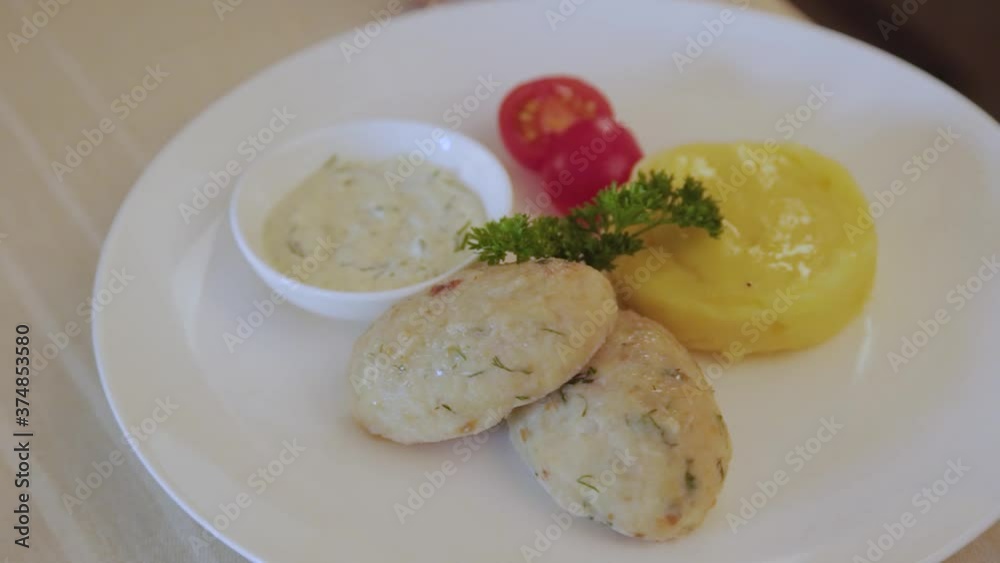 Fresh mashed potatoes with cutlets and sauce. Fresh mashed potatoes with cutlets and sauce.