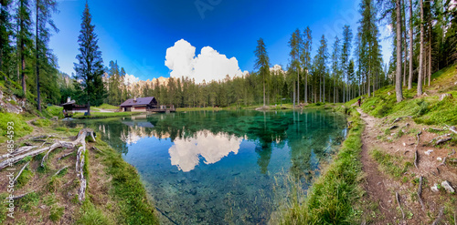 Fototapeta Naklejka Na Ścianę i Meble -  Beautiful chalet by the lake, mountain landscape panorama