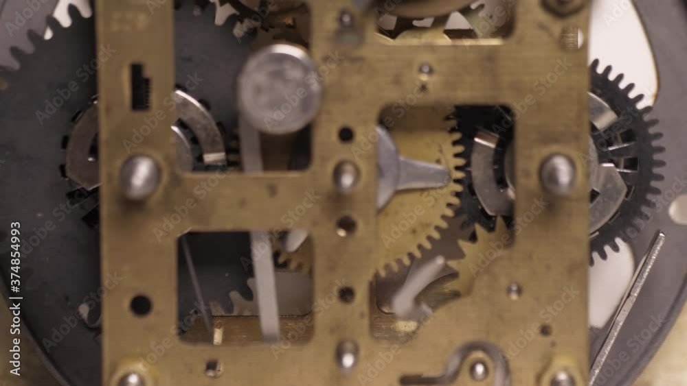 old clock mechanism with metal gears macro shot slow motion 4k old clock mechanism with metal gears macro shot slow motion 4k