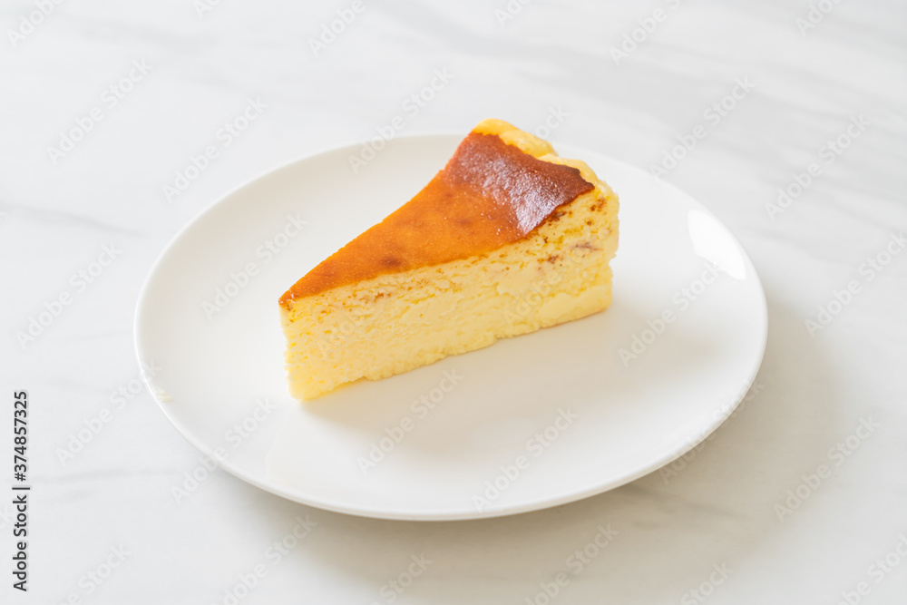 burn cheesecake on white plate burn cheesecake on white plate