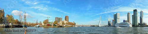 Rotterdam  Netherlands  panoramic view on the Muese river with left the historic Ferry harbour  Veerhaven   the Erasmus bridge and right the modern architecture of  Kop van Zuid .