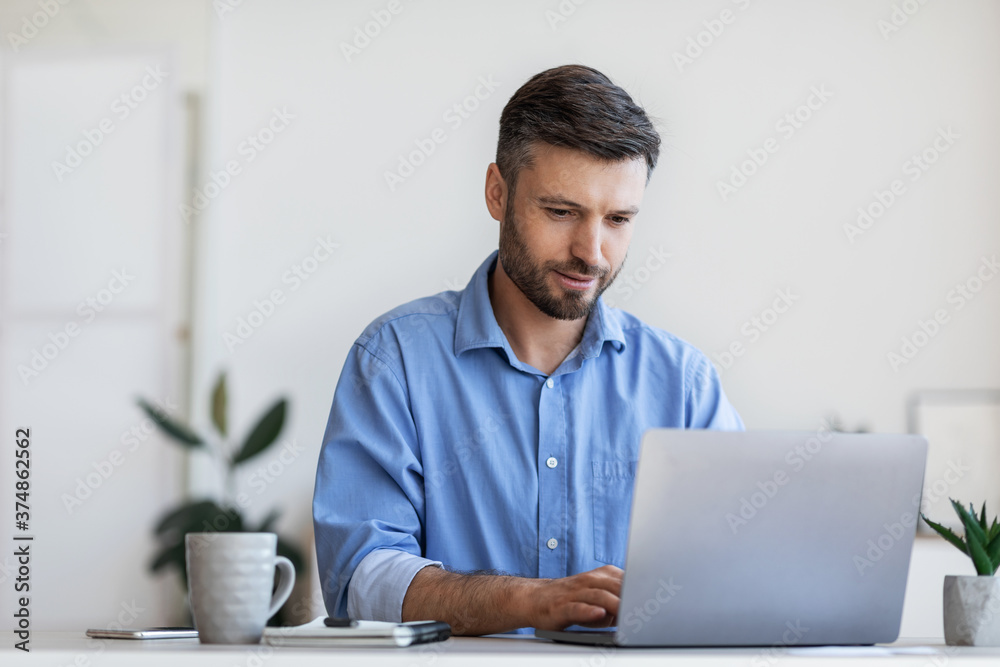 Business Lifestyle. Busy Office Worker Using Laptop At Workplace In Office