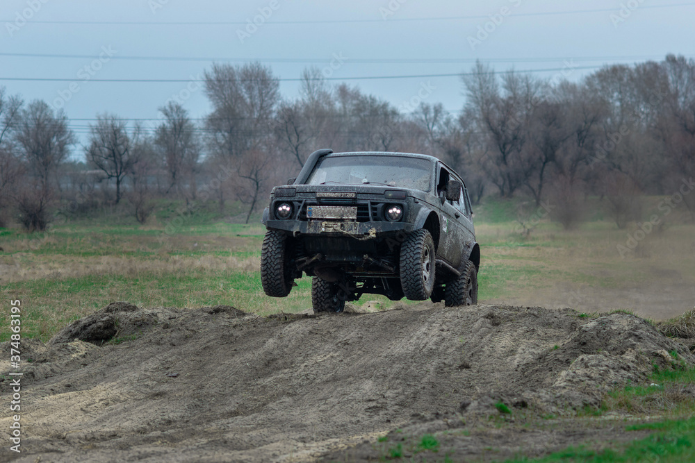 Amazing UTV driving in mud at Autumn day Amazing UTV driving in mud at Autumn day
