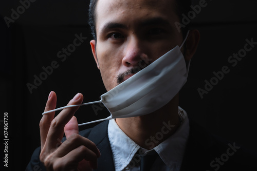 Businessman in suit wearing...