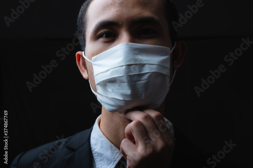 Businessman in suit wearing...