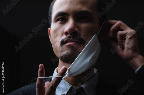 Businessman in suit wearing...