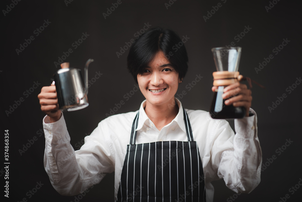 Professional female barista smiling, portrait of young female coffee maker in the cafe Professional female barista smiling, portrait of young female coffee maker in the cafe