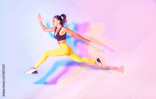 Beautiful fit woman making sport and running © oneinchpunch