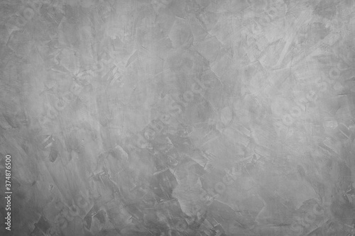 Abstract background of modern loft cement texture. The gray concrete wall has some scratch without a fixed pattern. Can be used in graphic design and for creating various backgrounds.