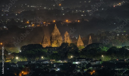 night view of Prambanan temple with city light on background