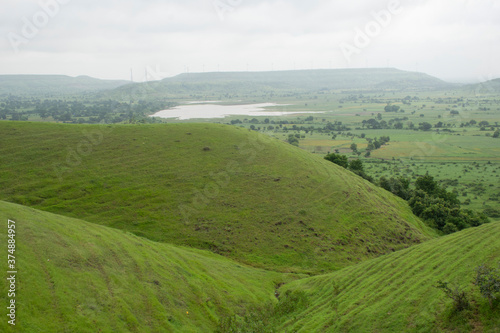 LANDSCAPE GREEN HILL SLOPE WITH CLOUD 