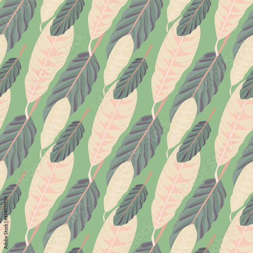 Seamless pastel soft pattern with hand drawn leaf silhouettes. Ornament in purple and pink light colors on green background.