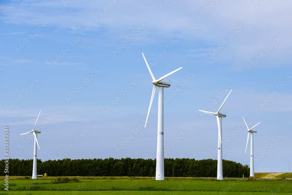 Windturbines near Harlingen in the dutch landscape Windturbines near Harlingen in the dutch landscape