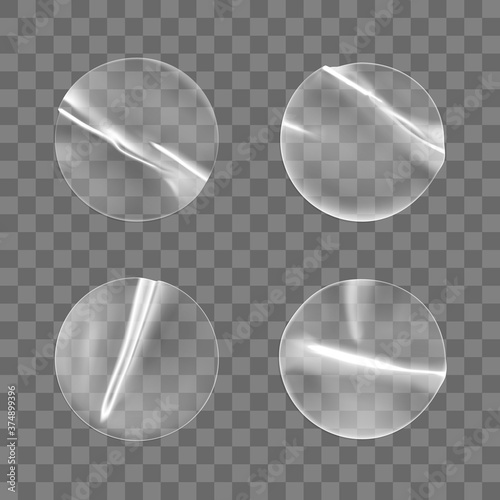 Transparent round adhesive stickers mock up set isolated on transparent background. Plastic crumpled round sticky label with glued effect. Template of a label or price tags. 3d realistic vector mockup