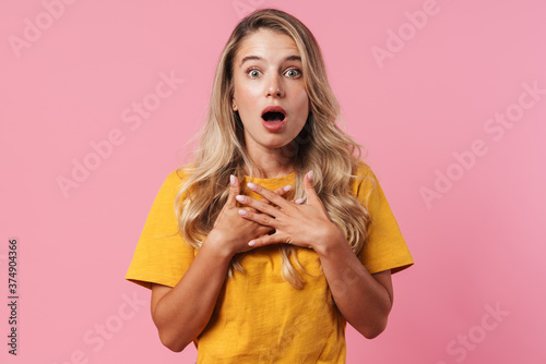 Image of shocked blonde girl expressing surprise at camera