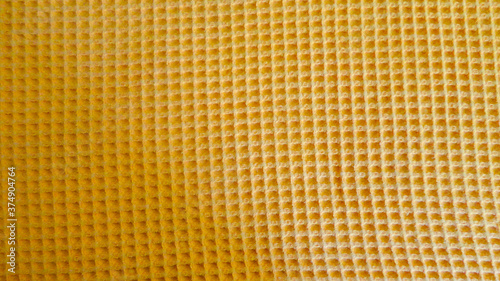 Orange fabric texture for background close up top view
