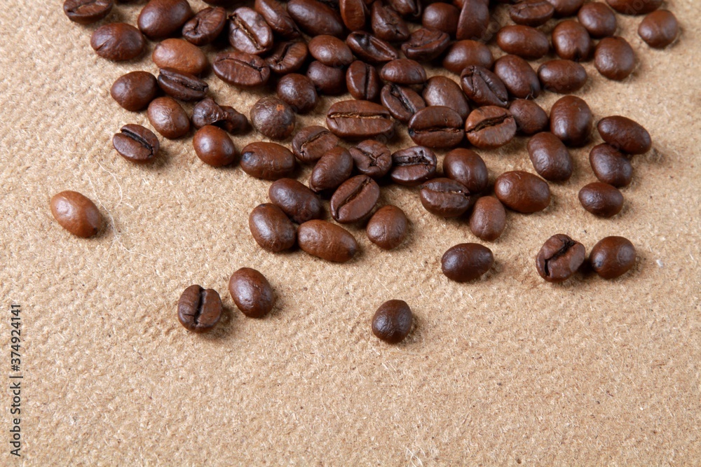 Coffee beans on burlap Coffee beans on burlap