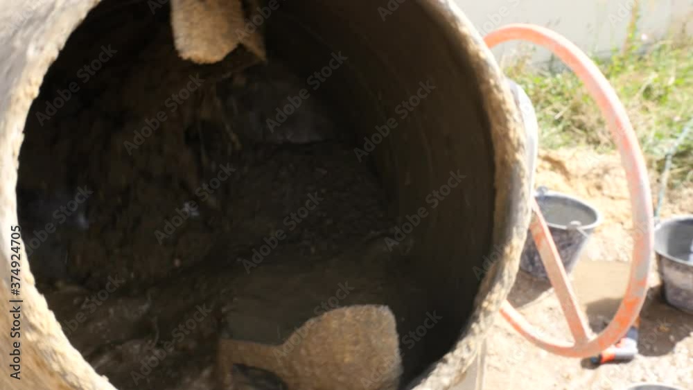 Masonry, Man leveling concrete slab for house terrace Masonry, Man leveling concrete slab for house terrace