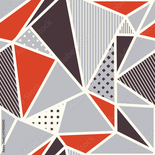 Seamless abstract pattern with triangles. Seamless patchwork in retro colors. Vector