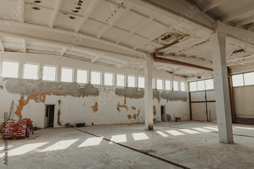 Inside an old industrial hall.