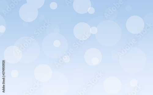 Abstract light blue bokeh background with soft lights.
