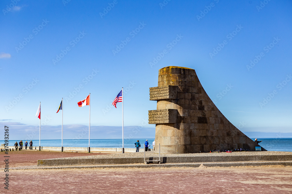 The omaha beach in Normandy, France, on a sunny day. - obrazy, fototapety, plakaty 