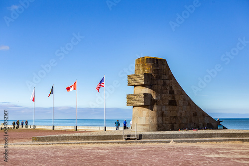 The omaha beach in Normandy, France, on a sunny day.