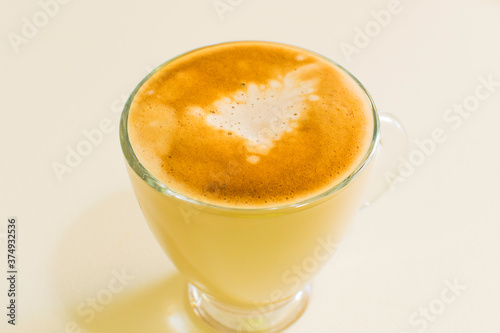 A coffe in a glass cup