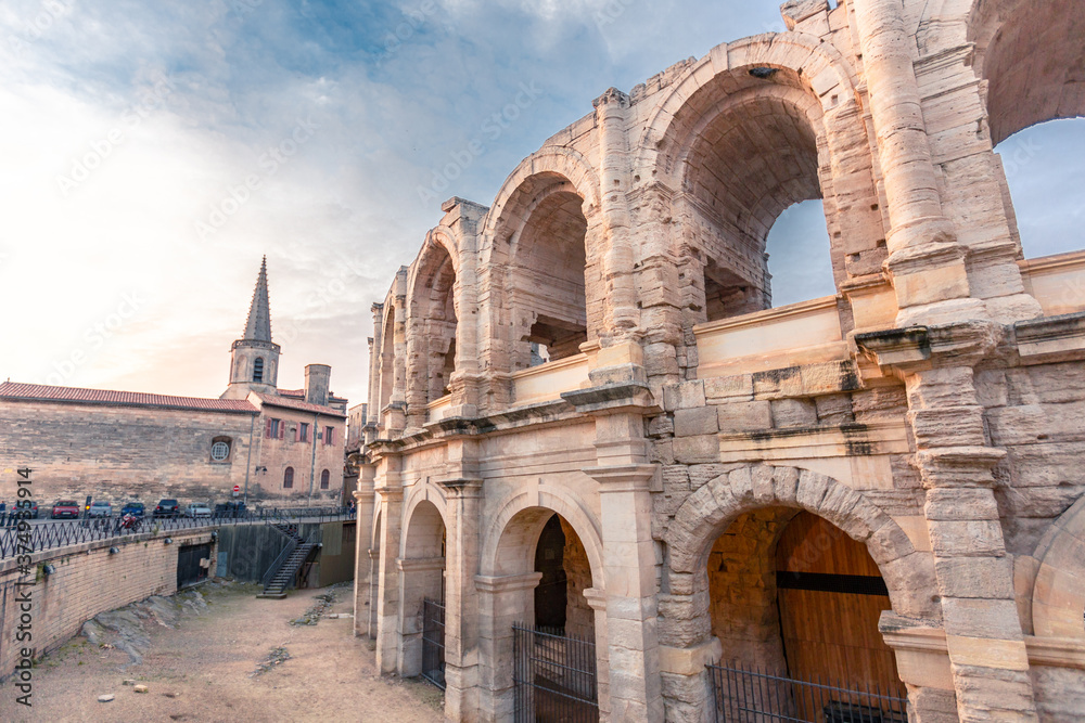 The ancient roman ruins in Arles, Provence, at sunset.