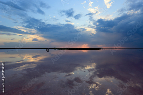 sunset sky over dead salt lake water surface