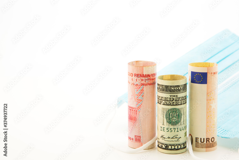Global investments in health protection fights pandemic crisis reflected in symbols of protective mask and national currencies of European Union, United States, and China Global investments in health protection fights pandemic crisis reflected in symbols of protective mask and national currencies of European Union, United States, and China