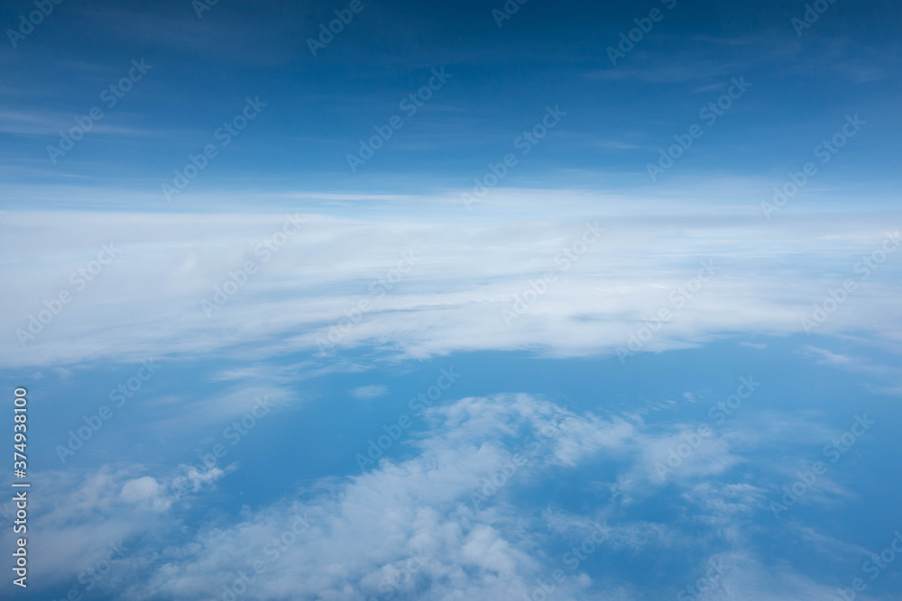 Cloud and blue sky from the airplane window Cloud and blue sky from the airplane window
