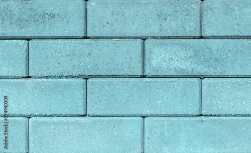 pastel blue brick wall background, horizontal architecture.