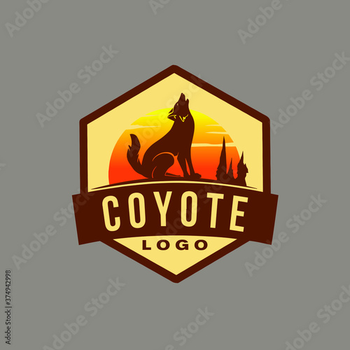 Howling Coyote or Wolf with sunset on hexagon logo concept, best for outdoor and ranch branding.