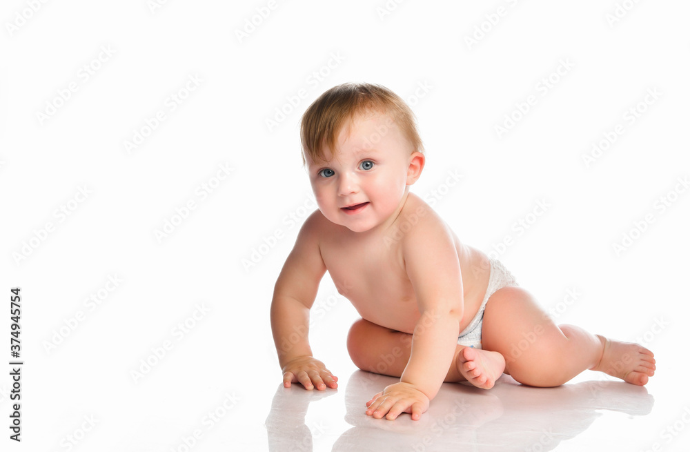 Portrait of a smiling little baby boy with blue eyes on a white background. Portrait of a smiling little baby boy with blue eyes on a white background.